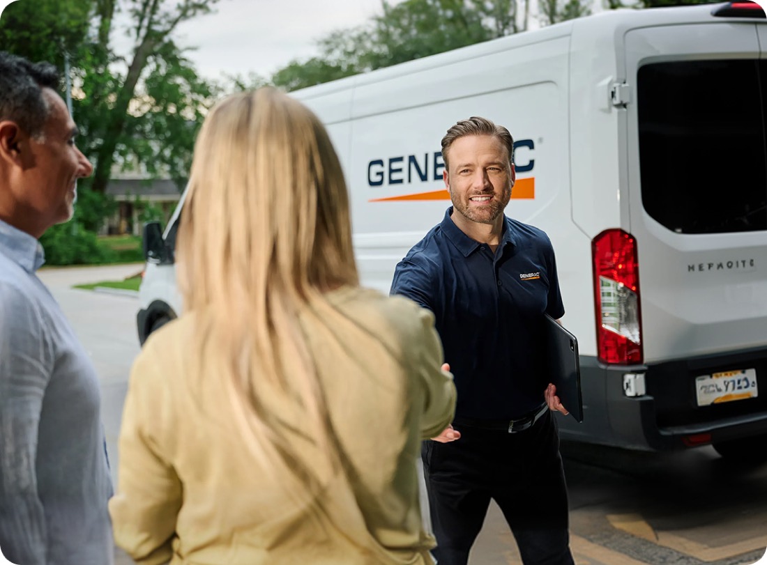 Generac dealer technician greeting Mobile homeowners at their driveway