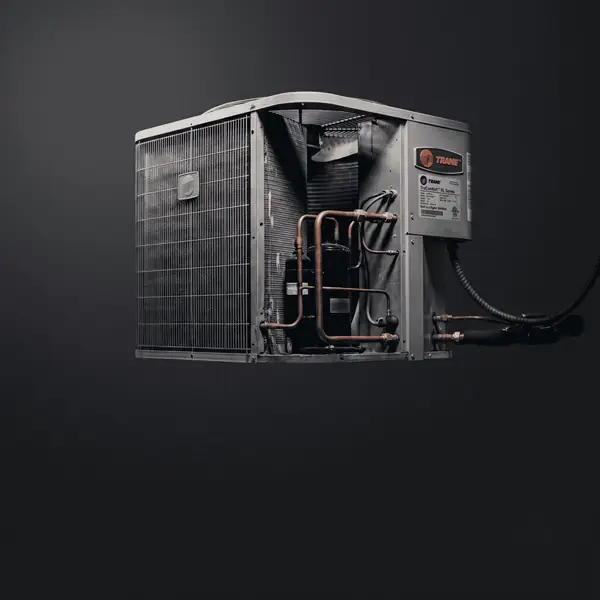 Technician arriving for an after-hours emergency AC repair